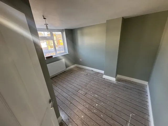 Decorated bedroom before the carpet finish was fitted
