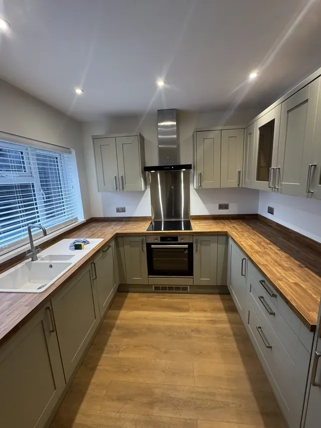 Kitchen sink, cooking area and fitted cabinets