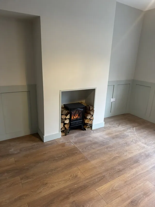 Living room fireplace feature, wall panelling and floor finish