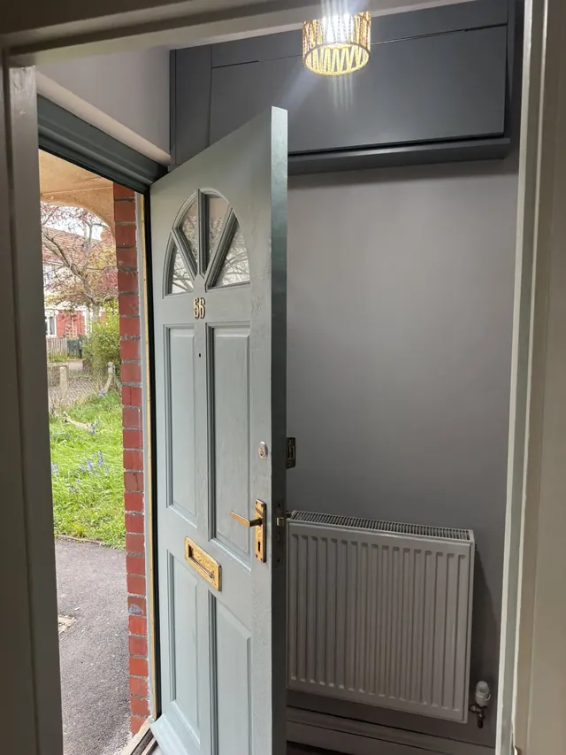 Decorated entrance area and front door