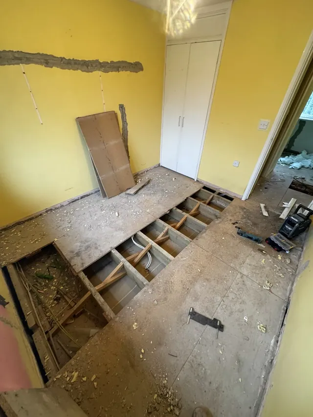 Lifted floorboards during preparation and floor repair works
