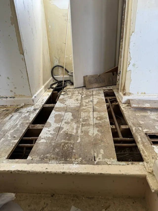 Floorboards opened during internal preparation and service access