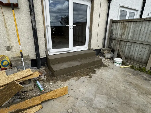 New access steps outside the rear doors during external work