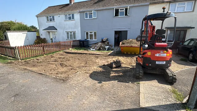 Ground preparation in front of the property during exterior work