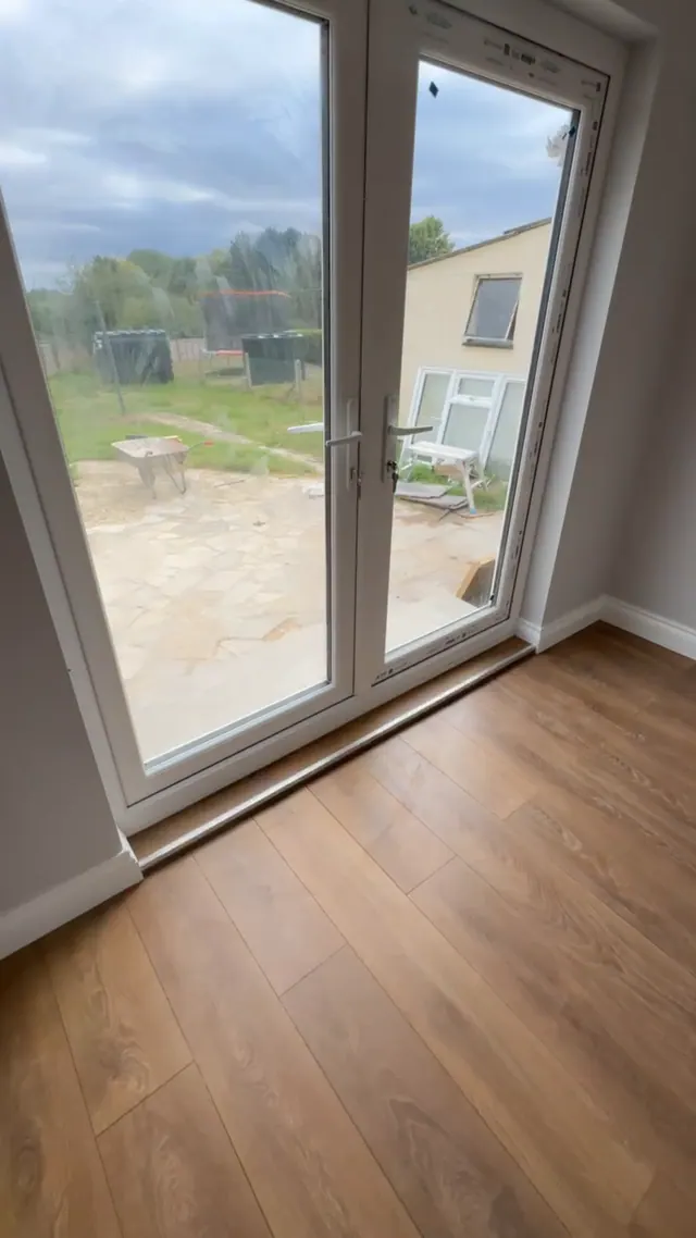 Later view of the floor finish and glazed rear doors
