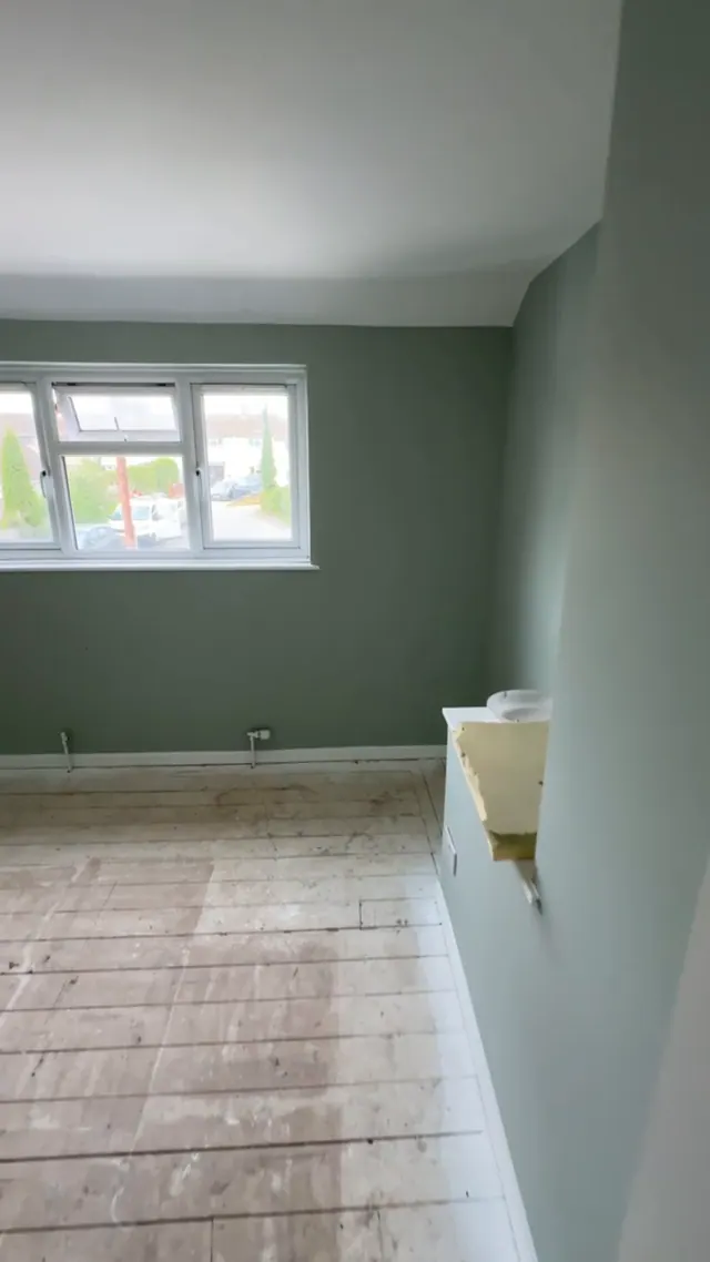 Decorated bedroom before the final floor finish was fitted