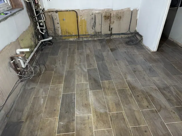 Kitchen floor finish in place before cabinet installation